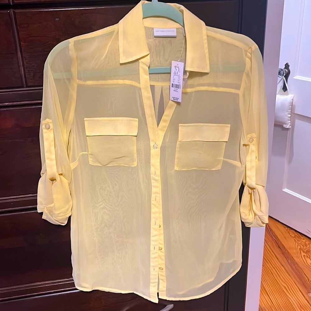 NWT sheer yellow with small white polka dots blouse. Size S